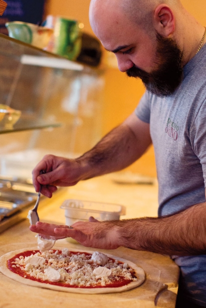 Chef Domenic Branduzzi making pizza