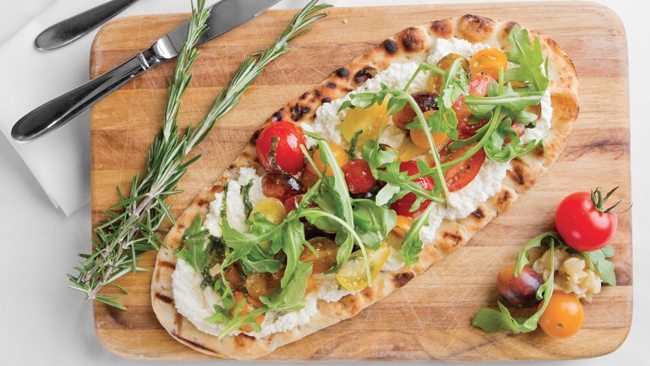 Grilled Flatbread with Ricotta Cheese, Heirloom Tomatoes, & Arugula